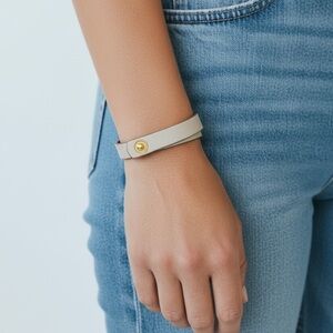 Stylish white  Bracelet with Gold Button